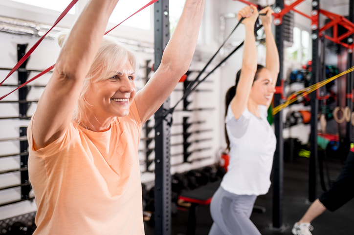Person lifting dumbbells
