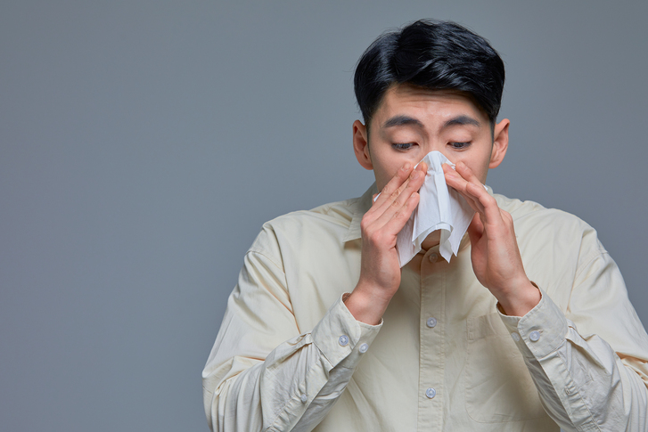 A person experiencing chest pain